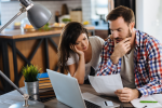 Couple looking at bills